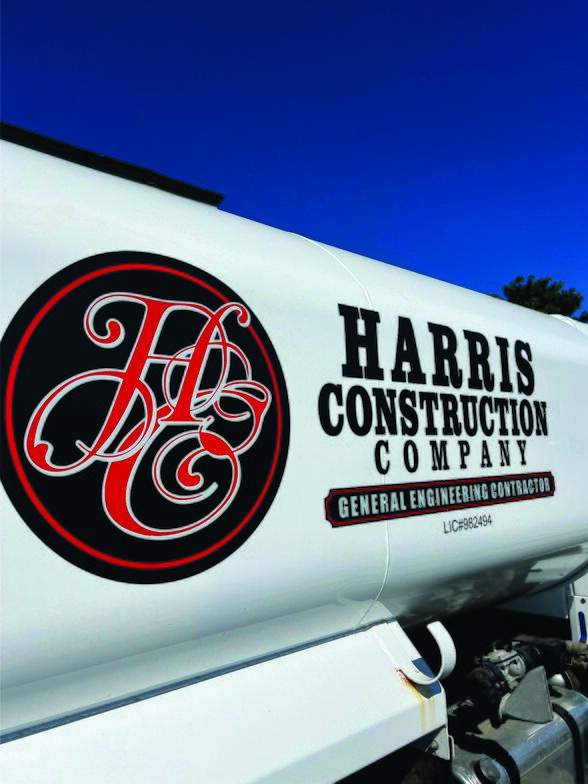 Water truck with Harris Construction Company graphics applied to the tank